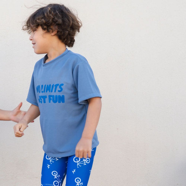 Our Set features a comfy pair of bicycle print tights and a matching top with the bold slogan “No Limits, just fun”