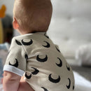 Short sleeve onesie with envelope neckline
Snaps at crotch to assist with easy diaper changes.
100% Cotton Interlock cuddly and soft for babies Skin

Available in NB - 18-24M