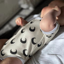 Short sleeve onesie with envelope neckline
Snaps at crotch to assist with easy diaper changes.
100% Cotton Interlock cuddly and soft for babies Skin

Available in NB - 18-24M