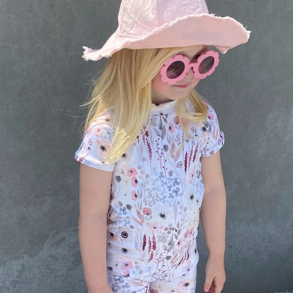 Floral Full body suit designed in such a stylish Girly print. 
Full Body Swimsuit Style             
Snug Body fit
Zipper at back
Option of Short or Long sleeves
UPF50+