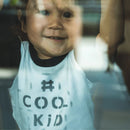 Comfortable Relaxed Fit
Two Toned Tee - Black Sleeves with Black Cool Kid Print on White
Rounded Neckline
Straight hem
Light and Soft 100% Cotton interlock jersey knit fabric.