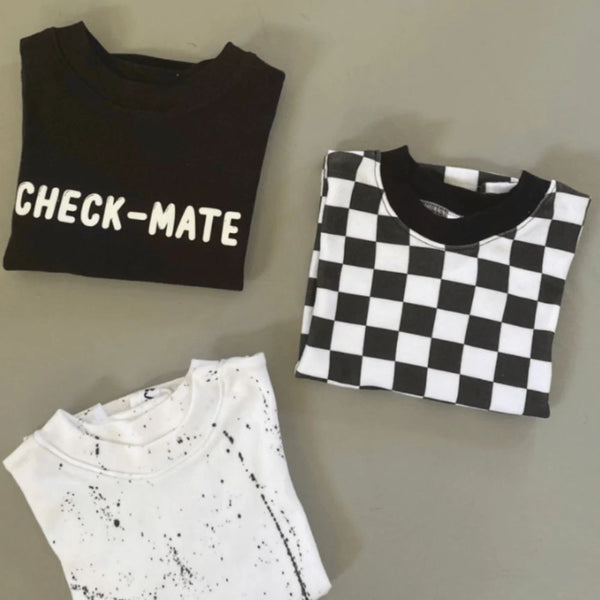 Comfortable Relaxed Fit
Black T-shirt with white print, White and Black Splatte, White and Black Check
Rounded Neckline
Straight hem
Light and Soft 100% Cotton interlock jersey knit fabric.