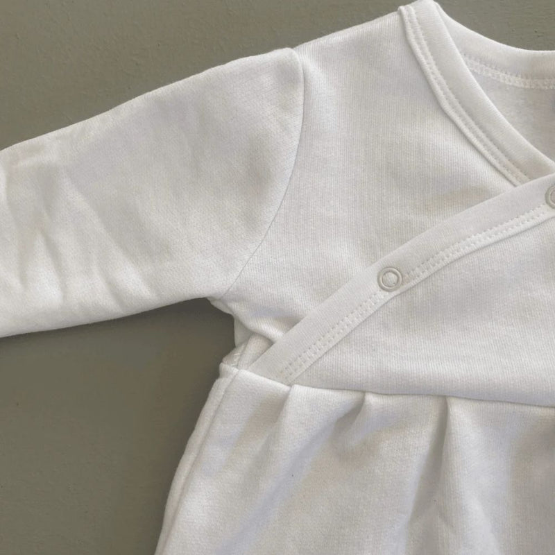 Long Sleeve cross-over wrap top for girls
100% Cotton Brushed Fleece

Available in White / Oatmeal / Beige