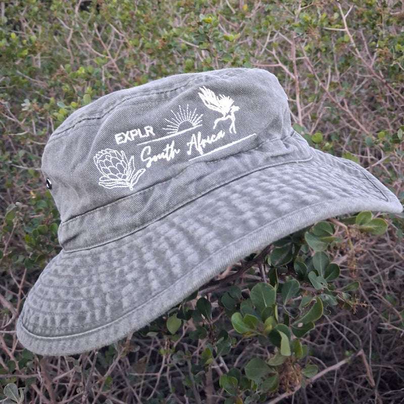 From road trips to riverbanks, the EXPLR Washed Bucket Hat is made for laid-back days under the African sun. With a soft, worn-in feel and relaxed fit, this hat brings vintage vibes with modern comfort.