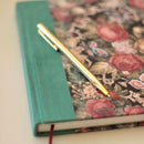 An essential tool for those who appreciate the art of writing, our new, elegant gold ballpoint pen with subtle LB logo is a wonderful gift for any stationery lover. Ideal for journaling, signing special notes, or just making your desk look fancy 