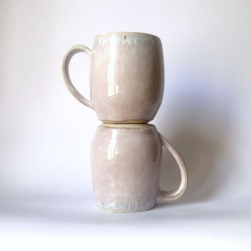 Handcrafted Mugs. Featuring a fading pink design. Ideal for a nice coffee. 