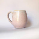 Handcrafted Mugs. Featuring a fading pink design. Ideal for a nice coffee. 