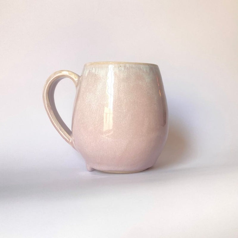 Handcrafted Mugs. Featuring a fading pink design. Ideal for a nice coffee. 