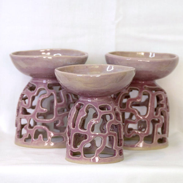 This handcrafted candle holder will transform any space, making it a meaningful addition to your home or sacred space. 