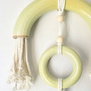 Reverberations are handcrafted wall-hanging art pieces combining textured stoneware and soft fibre elements.