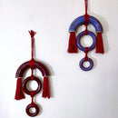 Unique ceramic wall hanging with fibre detail and bonded pieces. Fragile, handle with care.