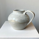 White glazed jug. Perfect for serving a special beverage or juice.