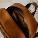 Say hello to Tigo the Tiger, the boldest buddy in the bunch!
He’s full of charm and courage, handcrafted from premium leather with a ripstop lining made to last. With one open and one zip pocket inside, Tigo helps keep every tiny explorer organized.