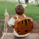 Say hello to Tigo the Tiger, the boldest buddy in the bunch!
He’s full of charm and courage, handcrafted from premium leather with a ripstop lining made to last. With one open and one zip pocket inside, Tigo helps keep every tiny explorer organized.