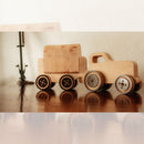 Larry the Truck Hauler: Larry's got the haul! This wooden truck hauler features four rounded blocks for kids to load and unload.