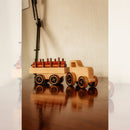 Oakley the Log Hauler: Haul logs with Oakley! This wooden log hauler comes with dowels to practice fine motor skills and imaginative play.