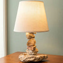 I turned to stone. It’s the ultimate medium of time. By combining traditional masonry techniques with modern lighting, I started crafting pieces that aren't just lamps, but "functional fossils."