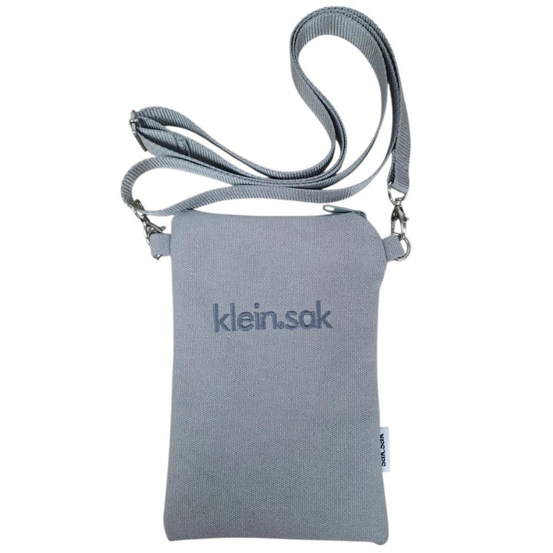 klein.sak Crossbody Bag

Handcrafted in South Africa, the klein.sak is the perfect everyday companion. Its sleek design comfortably holds your phone and something small. Made from durable, lightweight materials to keep up with your busy day.

✔️Locally made with attention to detail
✔️Lightweight yet durable for everyday use

material:
capri outer with strap x 1 
dimensions: 23cm x 15cm