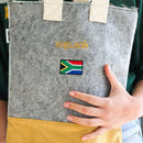 made from locally sourced materials

material:
Recycled PET plastic felt, capri material and a 100% cotton strap
dimensions: 38cm x 30cm