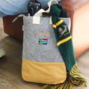 made from locally sourced materials

material:
Recycled PET plastic felt, capri material and a 100% cotton strap
dimensions: 38cm x 30cm