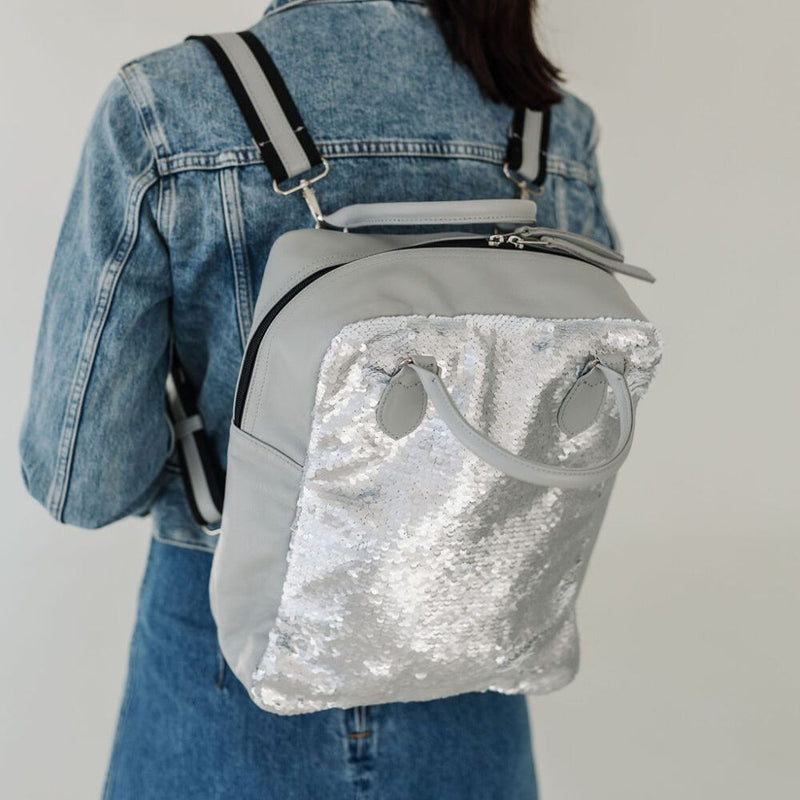 A bit smaller than the original backpack but still spacious enough for your laptop, jacket and travel mug. 