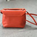 Lighter, softer and with an easy pop up handle and a detachable crossbody strap.  Meet the all new Brunch Bag.  Fully lined with custom lining, printed in South Africa. 100% Soft light grey leather with a silver/white sequins finish. Dimensions 23 cm (width) x 18 cm (height) 11cm (bottom) x 6cm (top)