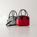 A limited-edition bag with only 10 pieces made. This exclusive design features exotic Nguni hair-on leather with delicate metallic gold splashes, beautifully complemented by a caramel leather back, bottom and sides.