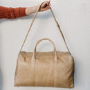 Dimensions: 52 cm x 30 cm x 25 cm. 100% cowhide with an inside lining and zip pocket.