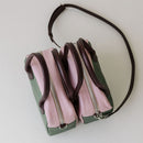 Updated handles, a refreshed crossbody strap with custom lining, printed in South Africa. 