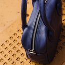 A limited-edition bag with only 10 pieces made. This exclusive design features exotic Nguni hair-on leather with delicate metallic gold splashes, beautifully complemented by a caramel leather back, bottom and sides.