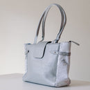 Dimensions: 32 cm x 28 cm x 13 cm. 100% Cowhide tote bag, with a custom lining inside and an inside zip pocket AND outside zip to protect all your goodies. Perfect for everyday life.