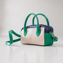 Lighter, softer and with easy handles and a crossbody strap.  Meet the all new MINI POSTCALL.