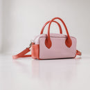 Lighter, softer and with easy handles and a crossbody strap.  Meet the all new MINI POSTCALL.