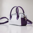 Lighter, softer and with easy handles and a crossbody strap.  Meet the all new MINI POSTCALL.