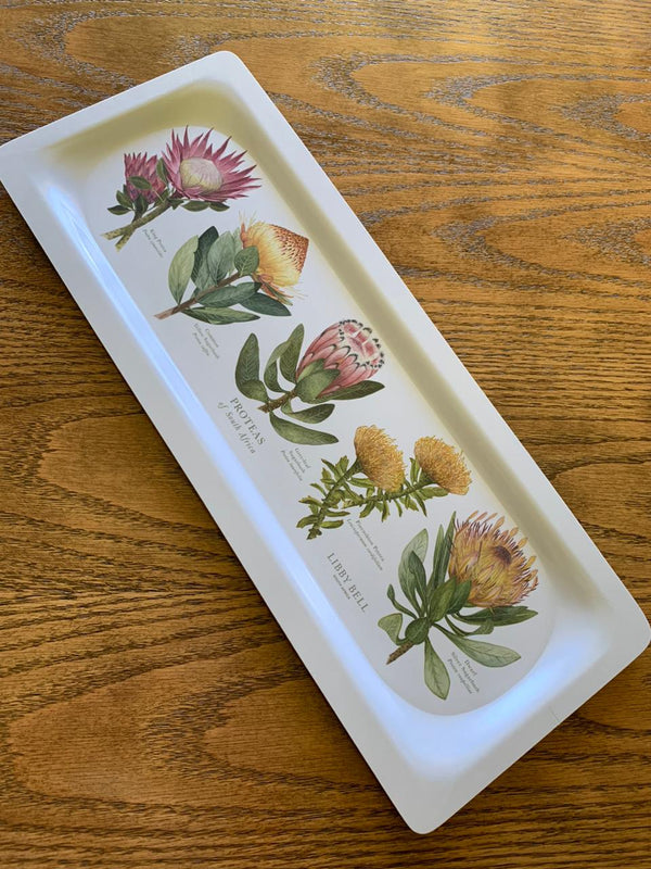 New protea trays made from 12 layers of compressed materials with a melamine coating and is 100% dishwasher safe!